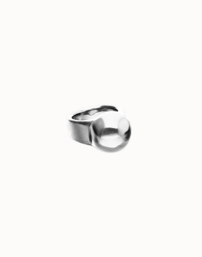 Sterling silver ring with a wide band and large, smooth sphere on top; available in sizes 6–9.