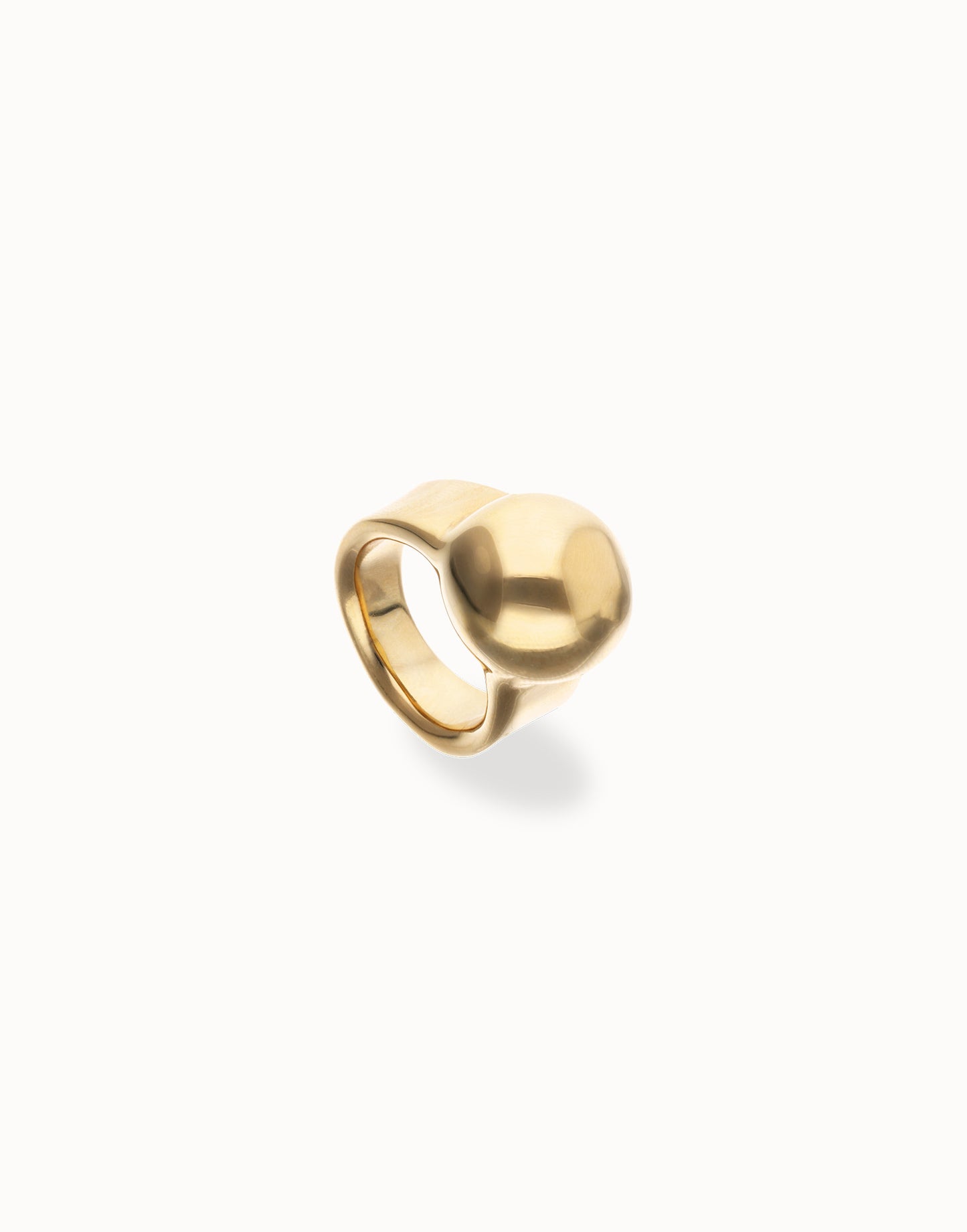 18k gold ring with a smooth, rounded sphere-shaped top and a thick band. Available in multiple sizes.