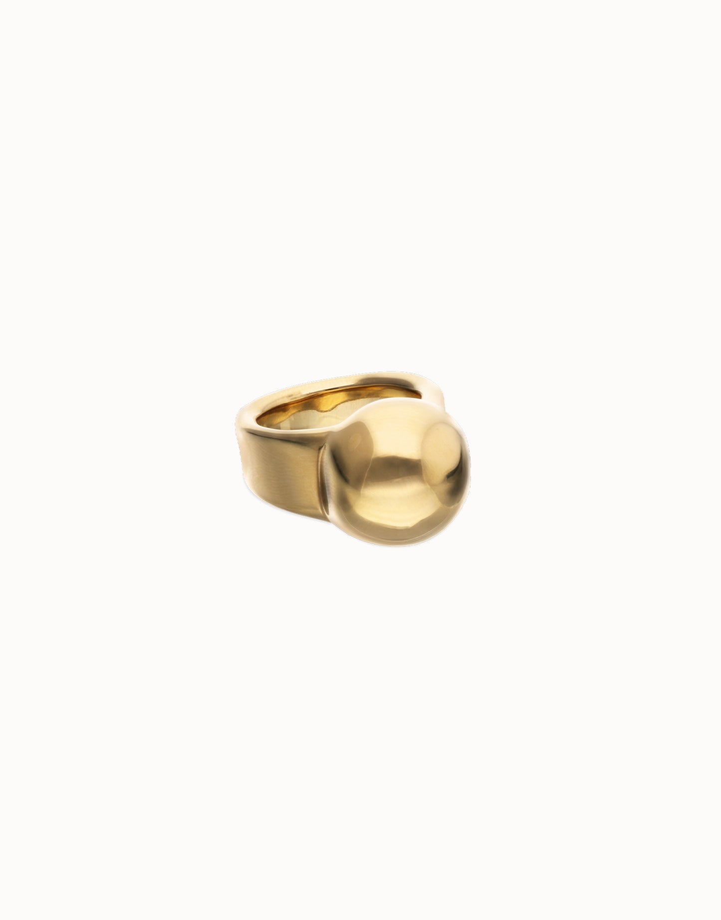 18k gold ring with a wide band and oversized smooth dome; available in sizes 5-9.