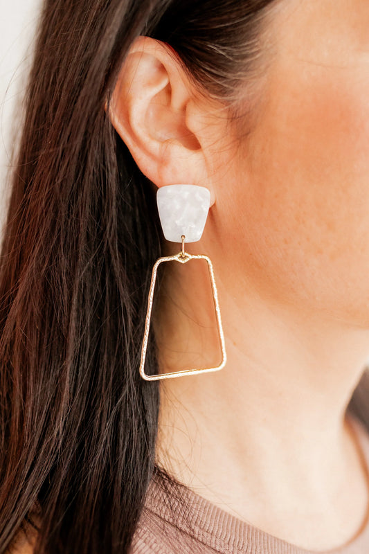 Kaelyn Earrings: White marbled top with large gold-plated rectangular hoop. Sizes: One size.