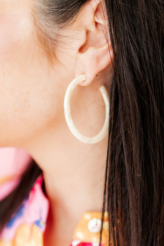 Holly Hoop Earrings: large, round, off-white hoops in nickel-free stainless steel for sensitive ears. Available in S/M/L.