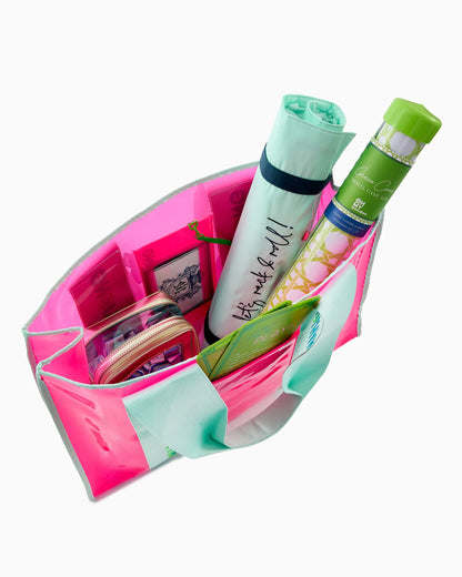 The Mahjong Beach Bag in pink and white, available in multiple sizes, shown from above.