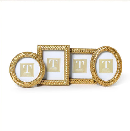 Set of four empty Laurel Wreath gold photo frames—two oval and two rectangular—with placeholder cards displaying a large "T" in the center. Available sizes: oval (5x7"), rectangular (4x6", 5x7").