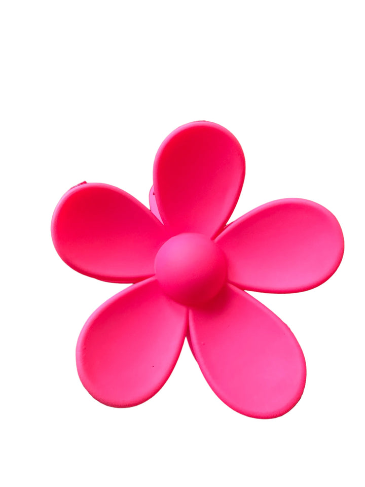 A bright pink, five-petal Flower Hair Clip with a soft, rounded appearance and a central circular button. Available sizes: One size.