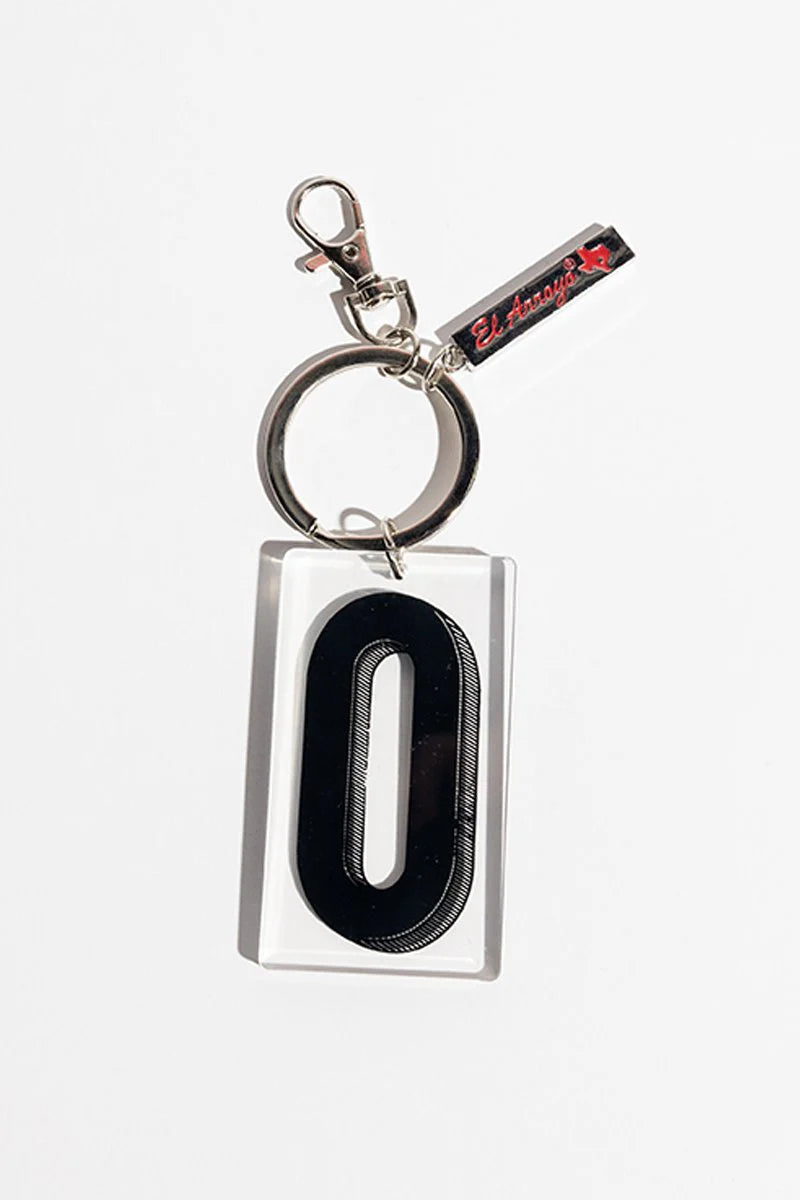 El Arroyo Marquee Letter Keychain with bold black "0", clear acrylic frame, metal ring/clasp, tag. Size: one size.
