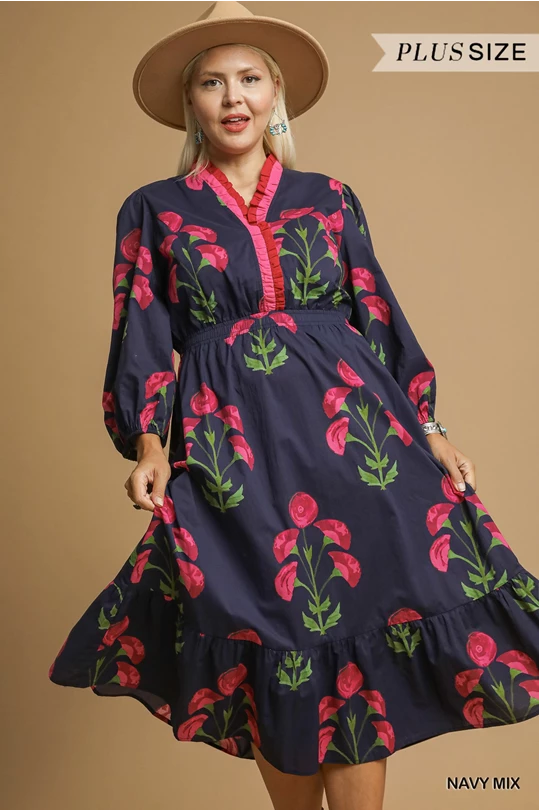 Louise Floral Midi Dress: navy, pink florals, long sleeves, ruffled hem, pink neckline trim. Available in plus sizes.
