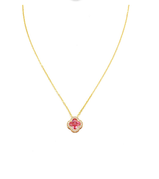 Delicate gold chain with clover pendant, pink gemstone center, and diamonds. Sizes available: 16", 18".