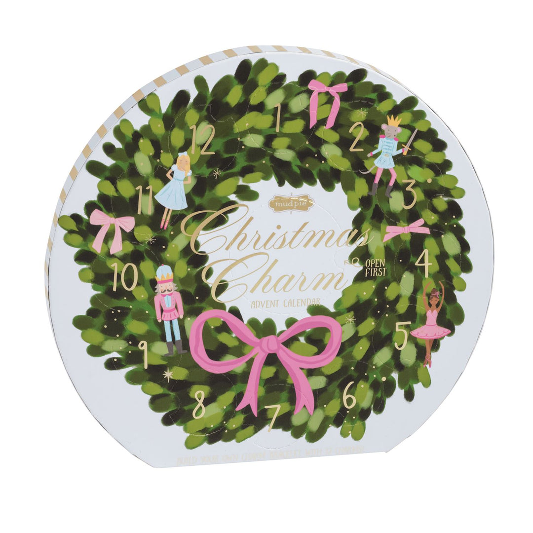 Wreath-shaped Twelve Days of Christmas Advent Calendar with numbers one through twelve and festive characters and bows.
