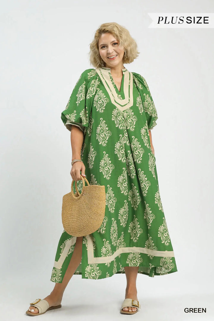 Green Abstract Print Midi Dress with green and cream pattern, flowy silhouette, breathable fabric. Available in plus sizes.