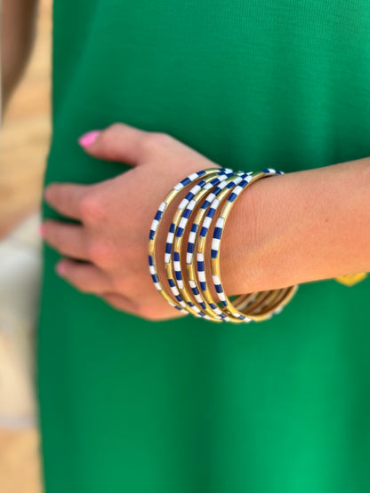Blue & White Veda Stack bangles shown on wrist. Available sizes: S, M, L. No other products included.