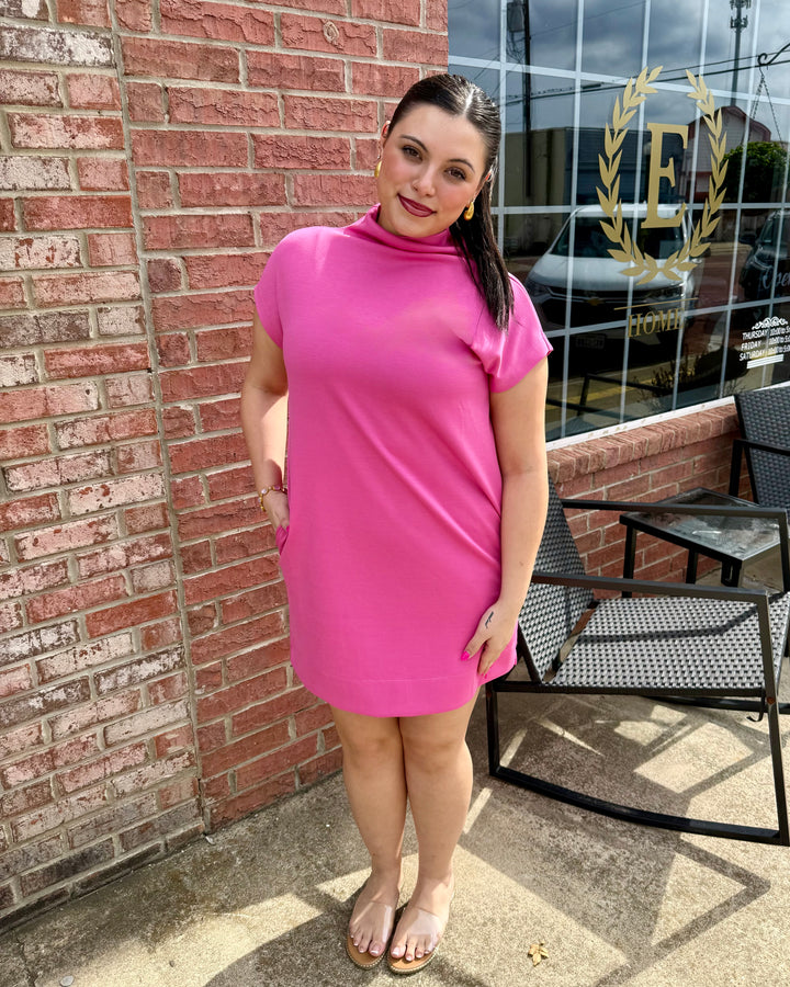 Pink Solid Mock Neck Pullover Dress. Available in sizes XS-XL.