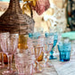 The Marseille & Remi Glass Blush is a pink pressed glass goblet. Available in multiple sizes.