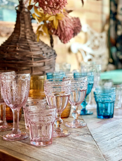 The Marseille & Remi Glass Blush is a pink pressed glass goblet. Available in multiple sizes.
