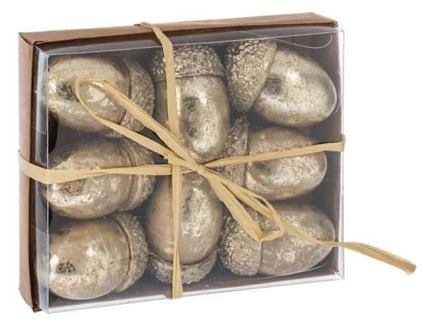 Boxed set of nine metallic gold acorn ornaments tied with a raffia ribbon.
