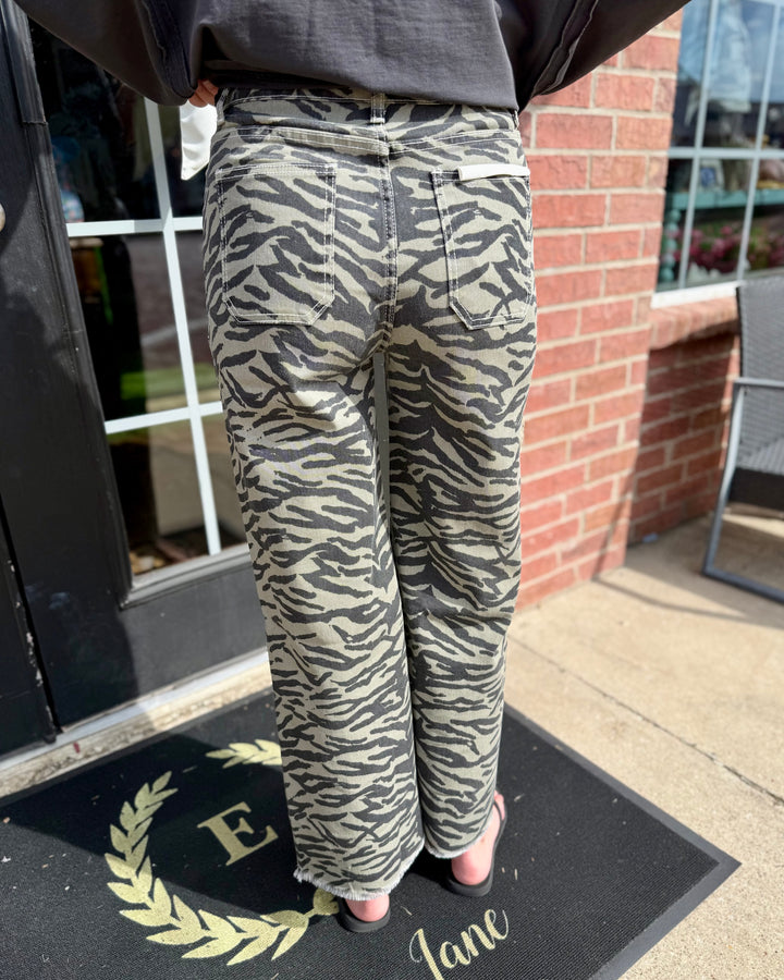 Zebra Print Wide-Leg Jean with high-rise waist; available in sizes 24–32.