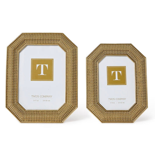 Set of two octagonal gold beaded photo frames with textured borders, each featuring a white insert with a gold "T" and "TWO'S COMPANY" logo; available in two sizes, one larger than the other.