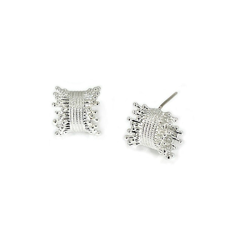 Wini Earrings: Silver stud earrings shaped like small, textured pillows with beaded edges. Available in multiple sizes.