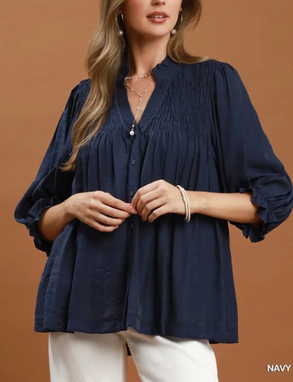 Navy Smocked Yoke Button Front Blouse with 3/4 sleeves, smocked yoke. Sizes: XS-XL.