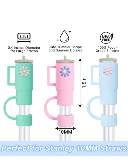 This product features a set of three Straw Cover Caps in light green, pink, and blue. Each cap is adorned with a delicate flower design. The caps are bpa-free and sized to suit large straws.