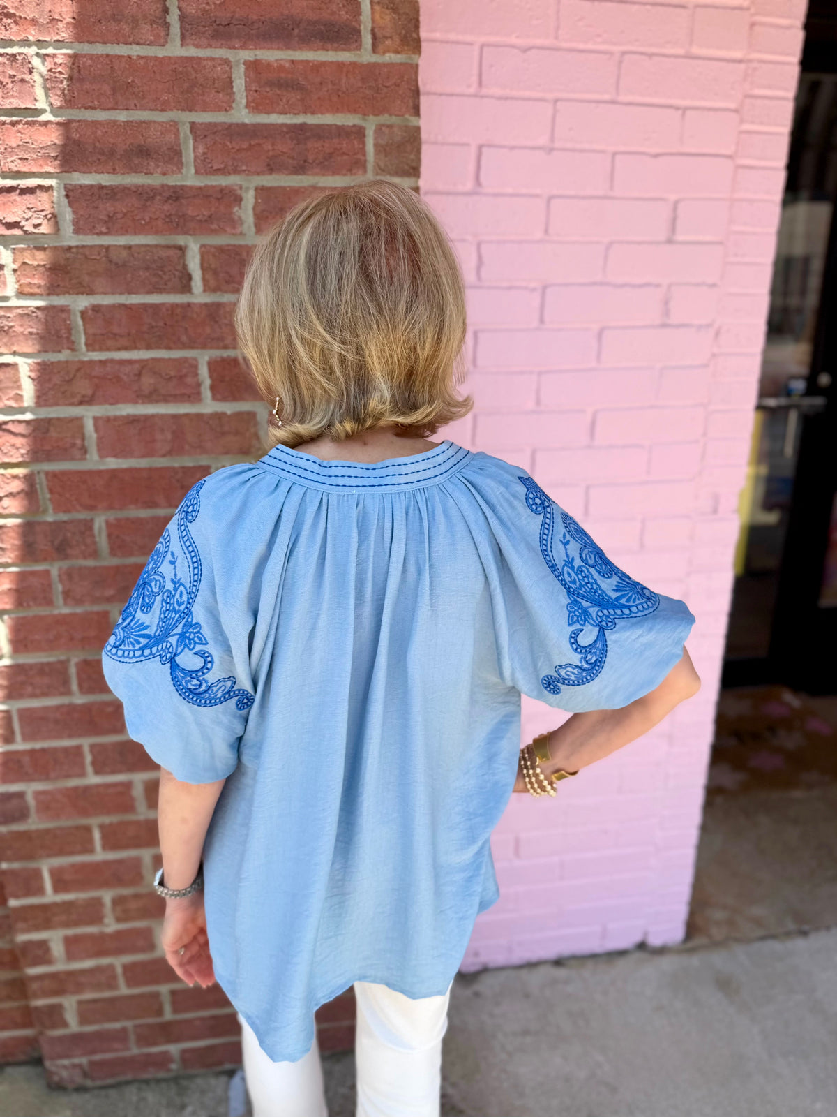 Light Blue Embroidered Puff Sleeve Top; available in XS-XL.