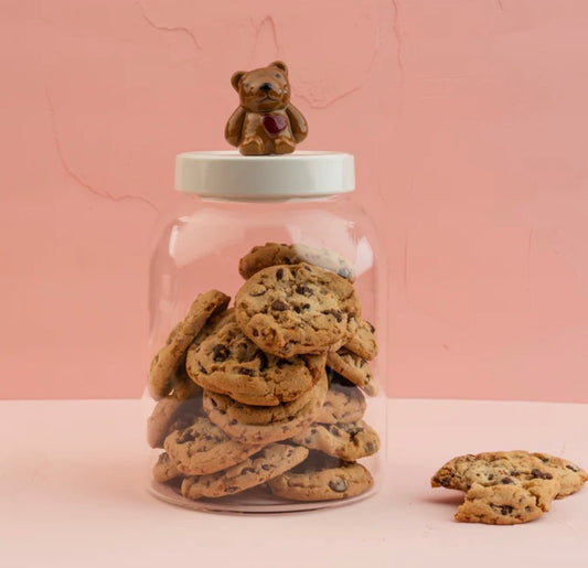 Super Duper Canister with a white lid and brown bear figurine topper. Available in small, medium, and large sizes.