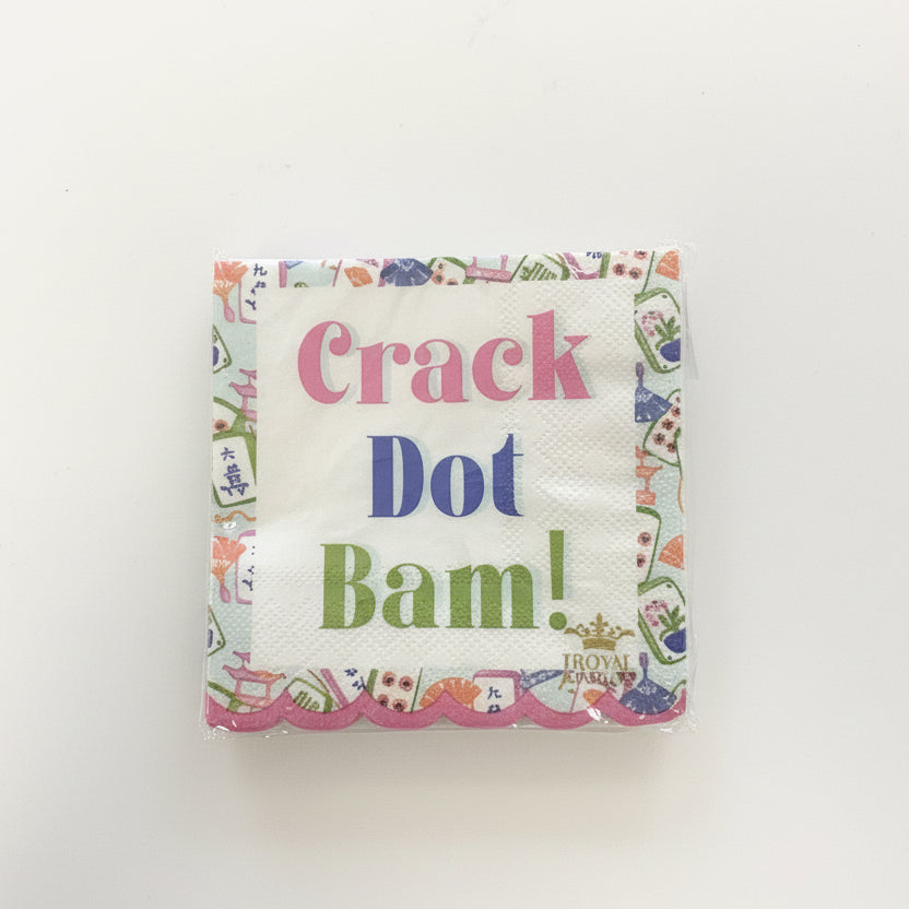 Crack Dot Bam! Cocktail Napkins: decorative scalloped napkins with “Crack Dot Bam!” in vibrant lettering and a Mahjong tile patterned border on white; available in cocktail size.