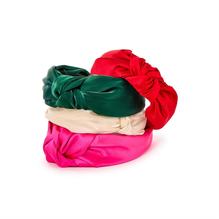 Three knotted satin headbands in green, red, and pink. Available in small, medium, and large sizes.