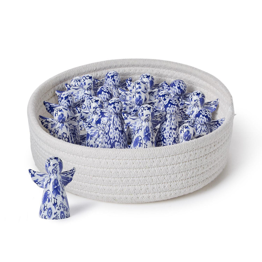 Blue and white patterned angel figures.