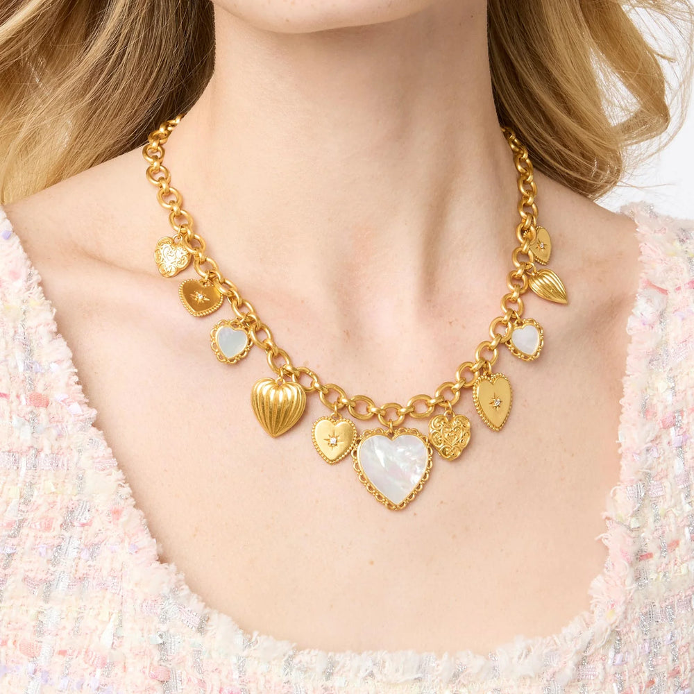 Heart Charm Necklace Mother of Pearl: vintage gold heart-shaped charms, mother-of-pearl accents. Available in 16", 18", 20".