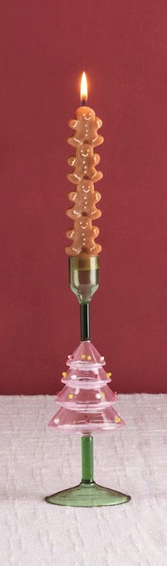 Four hand-painted gingerbread-shaped Christmas Mini Taper Candles.
