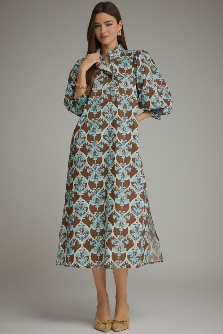 Lena Ruffle Midi Dress in brown and blue floral with ruffle collar and puff sleeves. Available in all sizes.