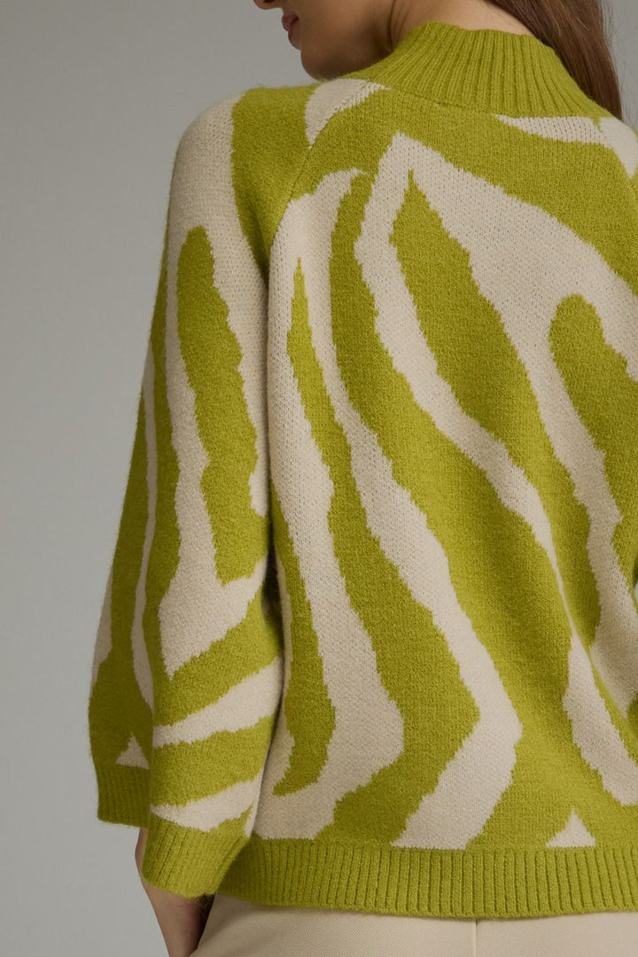 Lime green and beige zebra print mock neck sweater. Available in all sizes.