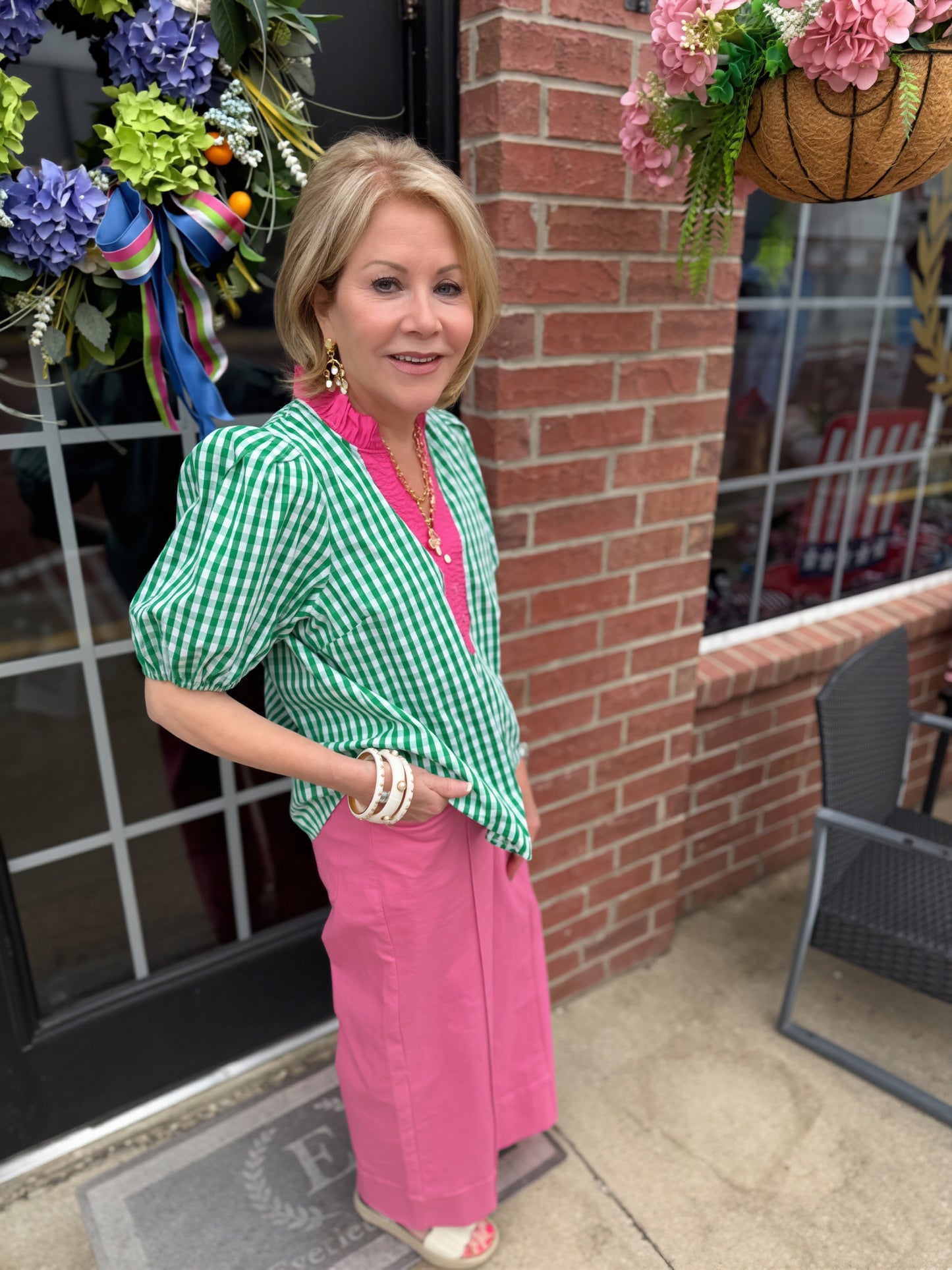 Watermelon Patch Gingham Puff Sleeve Top in green-and-white stripes. Available in sizes XS-XL.