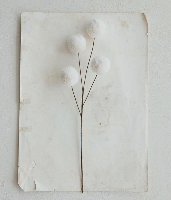 Faux Snowball Pick with four white spherical blossoms.