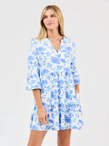 Laguna Blossom Breeze Dress: relaxed, long-sleeve, light blue/white floral print. Available in sizes XS-XL.