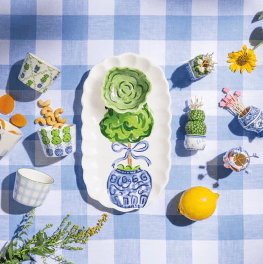 The Topiary Tray Tidbit Set is a hand-painted ceramic server with green topiaries. Available in small and large sizes.