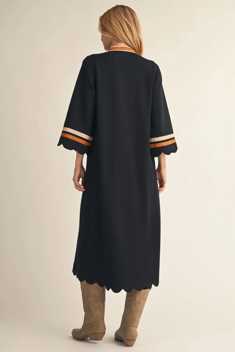 Black Solid Midi Dress with scalloped edges, relaxed silhouette. Available in sizes XS–XL.