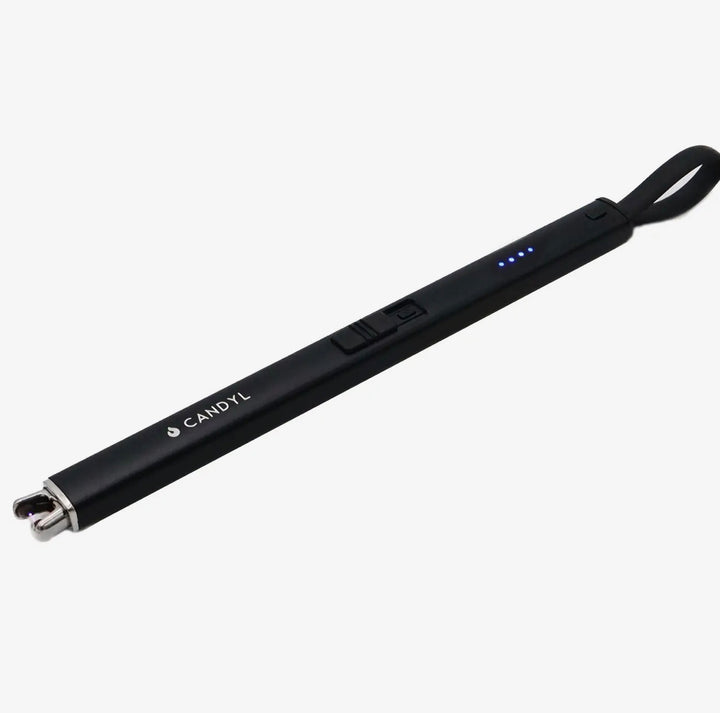 Slim, black rechargeable Electric Candle Lighter with wrist strap, LED indicator lights, and “CANDYL” branding on the side. Available in standard size.