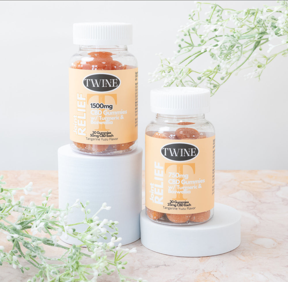 Two bottles of Joint Relief Gummies with turmeric and vanilla, available in 1500mg and 750mg CBD isolate strengths.