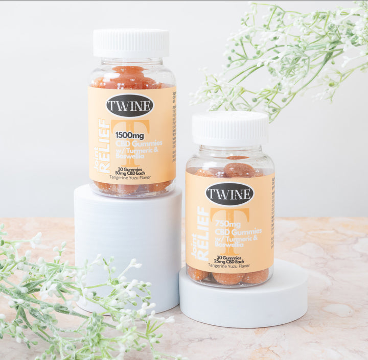 Two bottles of Joint Relief Gummies with turmeric and vanilla, available in 1500mg and 750mg CBD isolate strengths.