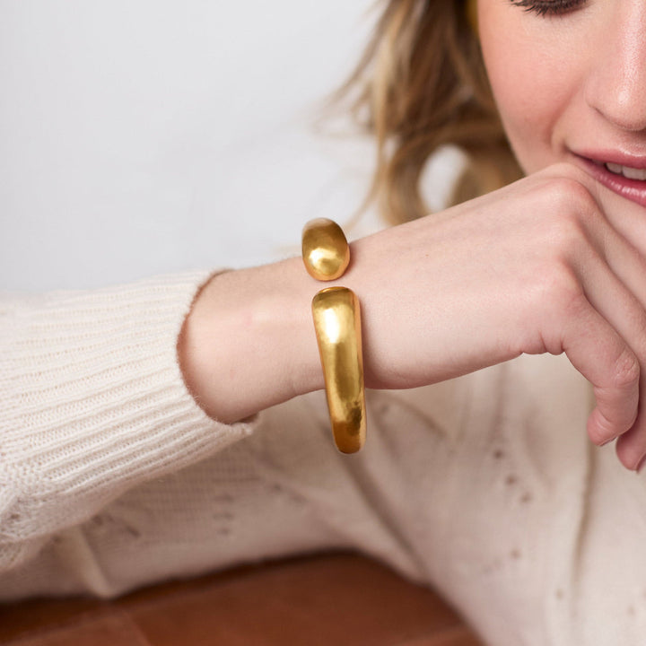 Solara Demi Cuff: chunky 24K gold plated bracelet, available in S, M, L sizes.