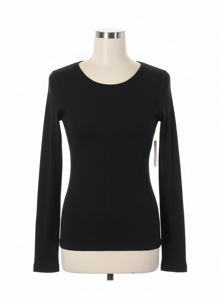 Black ribbed long sleeve top with round neckline. Available in sizes XS–XL.