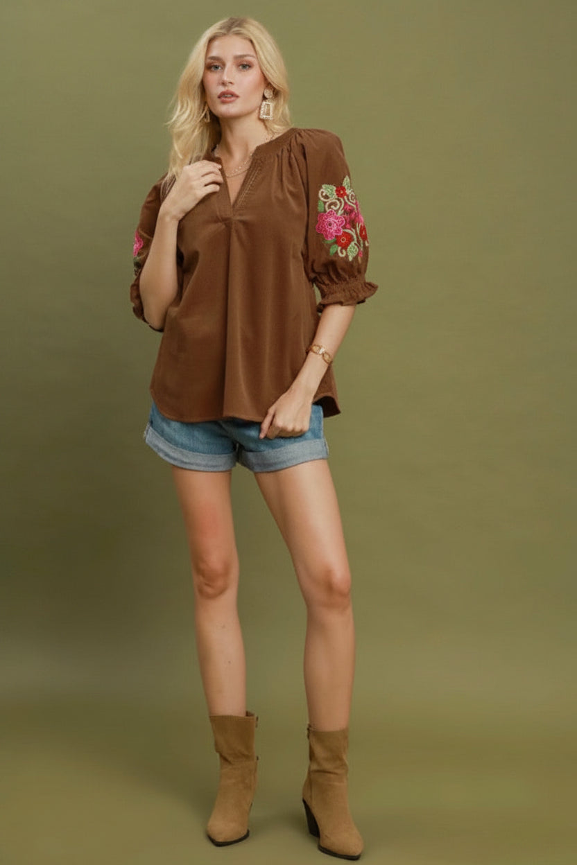 Embroidered Sleeve Corduroy Blouse with floral sleeve detailing. Available in sizes XS-XL.
