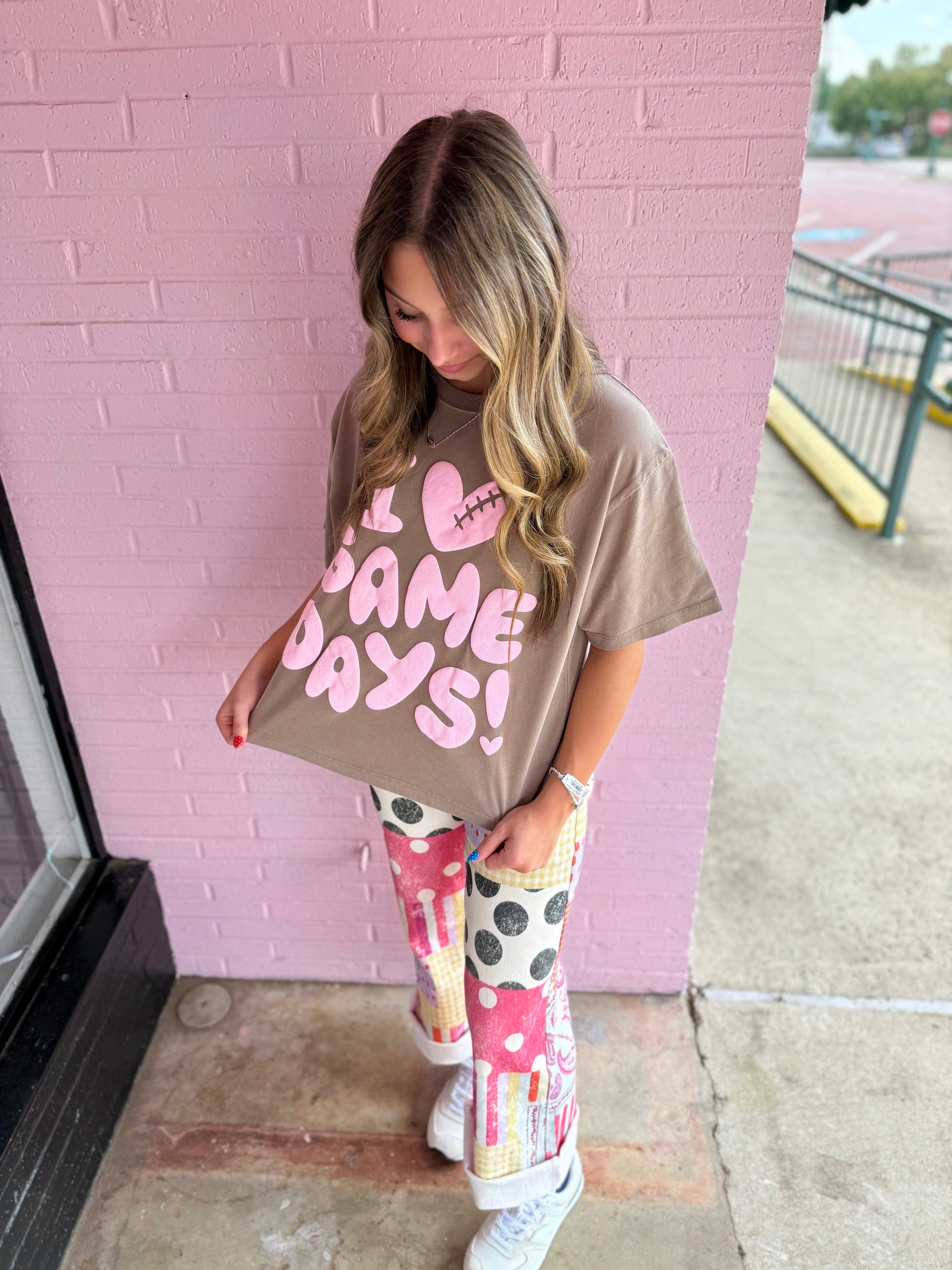 I Heart Game Day Tee with “I ♥ GAME DAYS!” in pink letters; available in sizes S-XL.