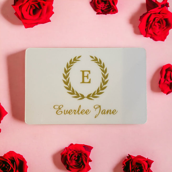 Everlee Jane Gift Card: white card with gold wreath and "E", "Everlee Jane" in cursive. Available in multiple sizes.