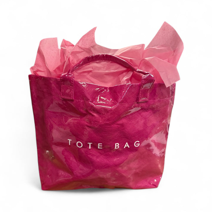 Vintage Tote Bag in shiny bright pink with bold white "TOTE BAG" text, waterproof. Available in small, medium, and large.