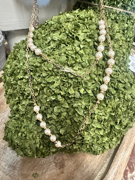 Water resistant gold beaded and pearl necklace, 32” length. Available in 32” size only.
