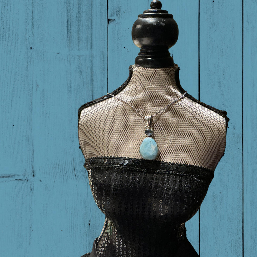 Black sequined strapless top; available in sizes S, M, L.