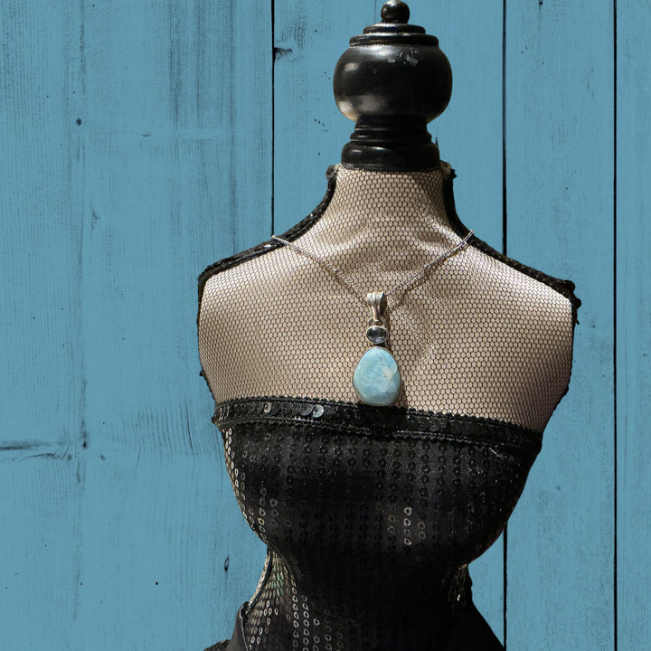 Black sequined strapless top; available in sizes S, M, L.