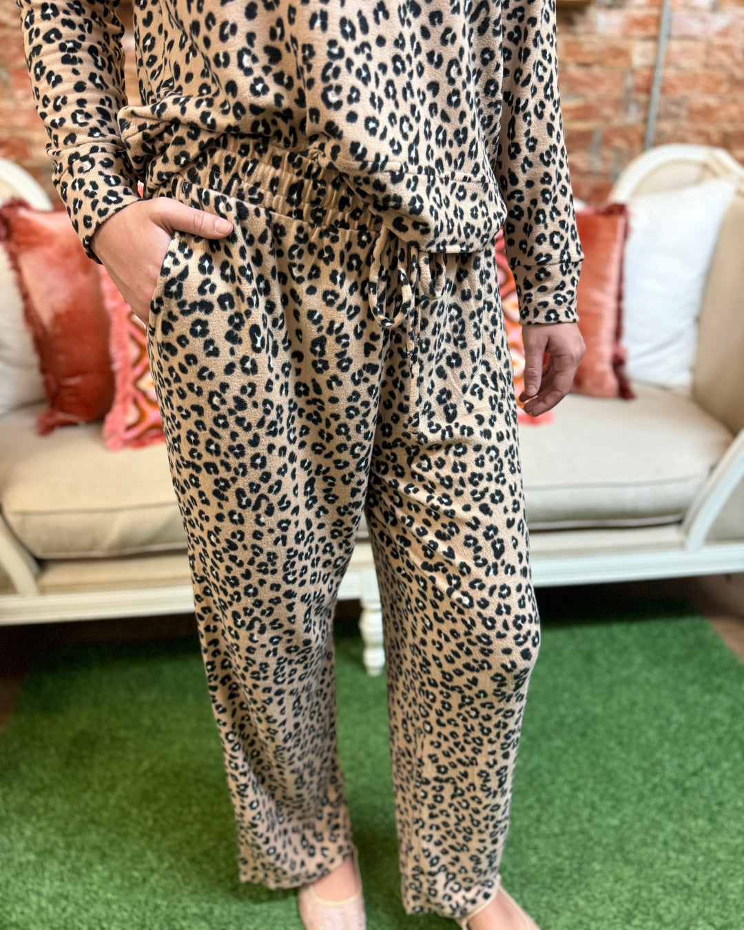Sophie Leopard Print Pajama Set featuring soft fabric and a relaxed fit; available in sizes XS to XL.